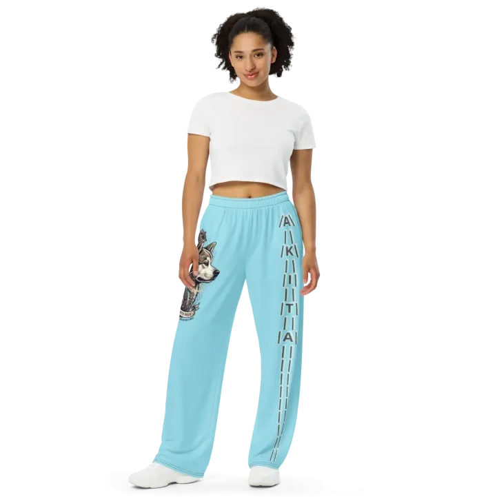 Unisex wide-leg joggers Akita Tattoo Art – front view, light blue, tattoo design with Akita portrait and AKITA stripe on opposite leg