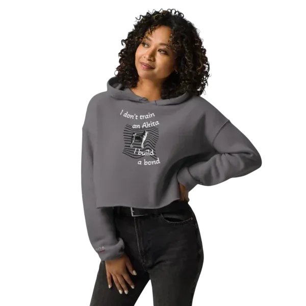 Women's cropped hoodie featuring an Akita Bond text design